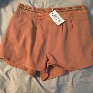 Salmon embroidered shorts